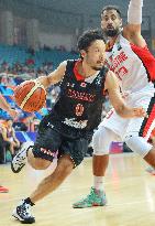 Japan beats Palestine to keep basketball quarterfinal hopes alive