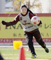 Retiring Sawa attends training session