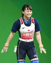 Olympic scenes: Smiling Japanese weightlifter Yagi