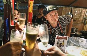 French chef at Fukuoka's famous food stand alley