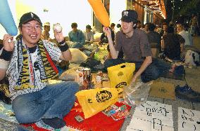 Tigers fans line up overnight