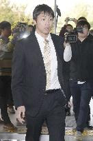 Japanese swimmer arrives at Incheon court over alleged camera theft