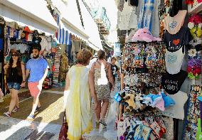 Tourists visit Athens' old historical district