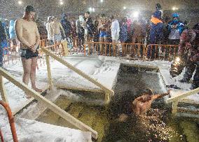 Believers bathe in icy waters for Russian Orthodox Church festival