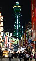 Osaka landmark tower lit up in green for World Glaucoma Week