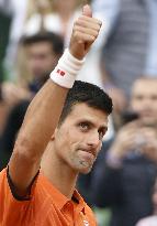 Djokovic through to French Open 2nd round