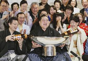 Terunofuji beams after winning summer sumo title