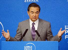 China urges Japan to accept its growing power for better ties