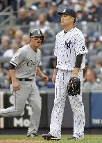 Tanaka gets no-decision in Yankees' win