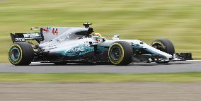 Hamilton stamps authority on Japanese GP q'fying with record lap