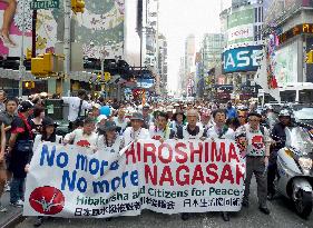 Japanese A-bomb survivors, mayors march for nuke-free world