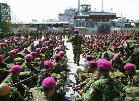 Indonesian military withdraws last troops from Aceh