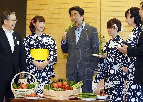 PM Abe promotes safety of vegetables from Fukushima Pref.