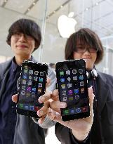 Apple's new iPhone models go on sale in Japan