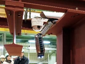 New robot unveiled for probing reactor gear at Fukushima plant
