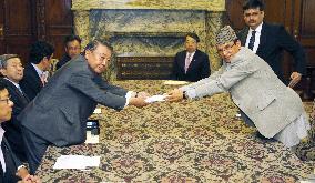 Japanese lawmakers make donation to quake-hit Nepal