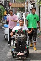 Man with cerebral palsy completes 700km wheelchair journey