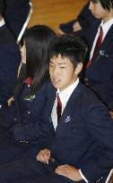 Lions Kikuchi attends high school commencement