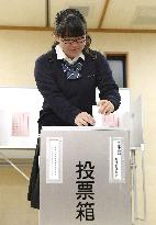 Politically savvy teen casts 1st early vote in Japan lower house election