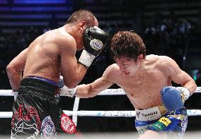 Boxing: Taguchi unifies IBF, WBA flyweight titles