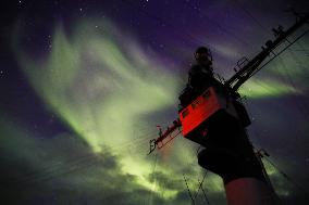 Aurora above Japanese icebreaker Shirase