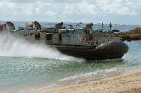 U.S. Marines transfer vehicles to ship