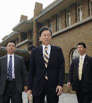 Hatoyama leaves new house