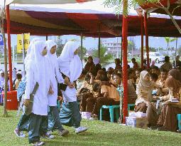 People flock to Aceh 'ground zero' to mark tsunami anniversary