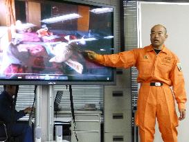 Rescue team chief explains operations on erupting volcano