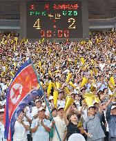 North Koreans cheer for World Cup qualifier vs Uzbekistan