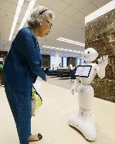 Humanoid robot "Pepper" makes debut at bank