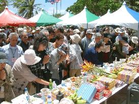 Japanese families commemorate victims of battles on Pacific isla