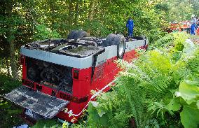 Tour bus overturns in Hokkaido