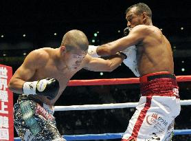 Kameda 1st Japanese boxer to win 3 world titles