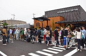 1,000 people queue for Starbucks shop opening in western Japan