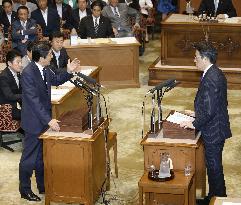 PM Abe, DPJ's Okada face off