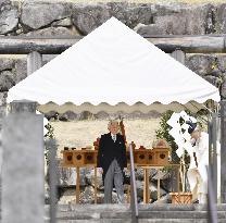 Emperor Akihito visits late father's mausoleum