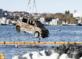 Tsunami-hit car found in northeastern Japan