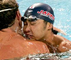 (3)Kitajima wins gold in 100m breaststroke