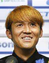 Usami attends press conference