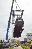 Steam locomotive brought back to railway park in western Japan