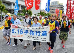 Protesters march in Okinawa ahead of 45th anniversary of reversion