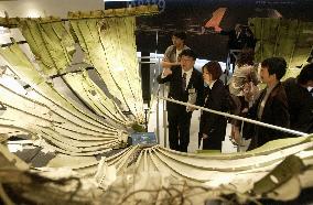 JAL unveils wreckage of 1985 jumbo jet crash for display