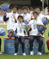 Japan retain team title in men's marathon