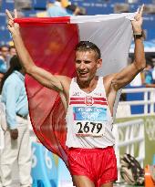 Poland's Korzeniowski wins men's 50km walk