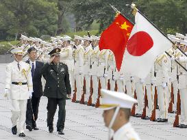 Japan, China hold defense minister talks in Tokyo