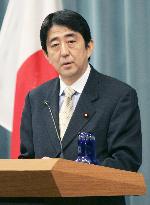 New gov't spokesman Abe cautions against BOJ policy shift