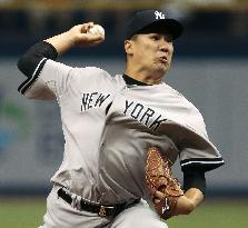 Tanaka delivers with 7 scoreless innings