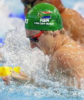 Van de Burgh sets world record in men's 50-meter breaststroke