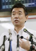 Japan's 2nd-largest opposition party may disband amid strife
